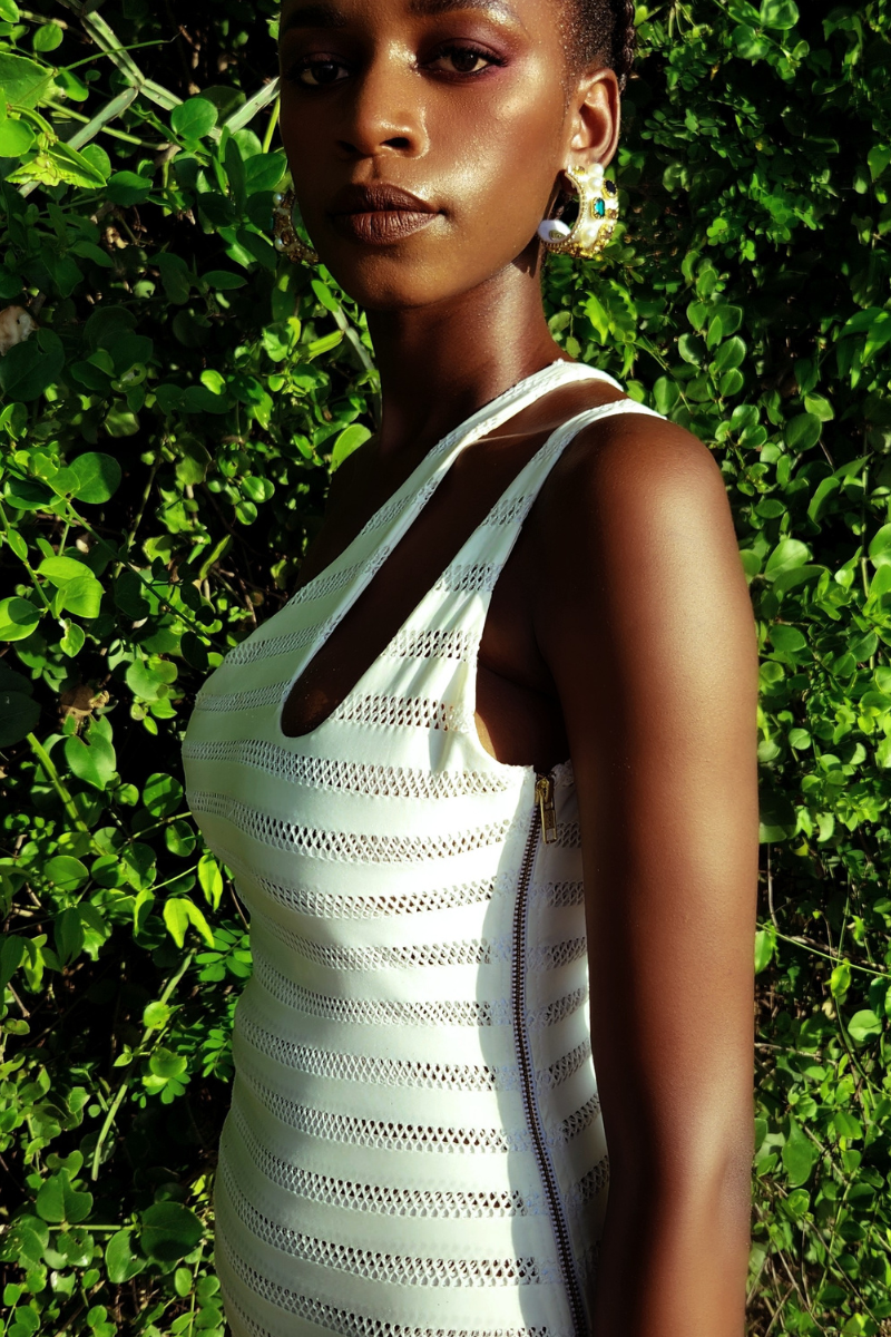 Woman wearing Anissa Mpungwe Atelier Moja Swimsuit