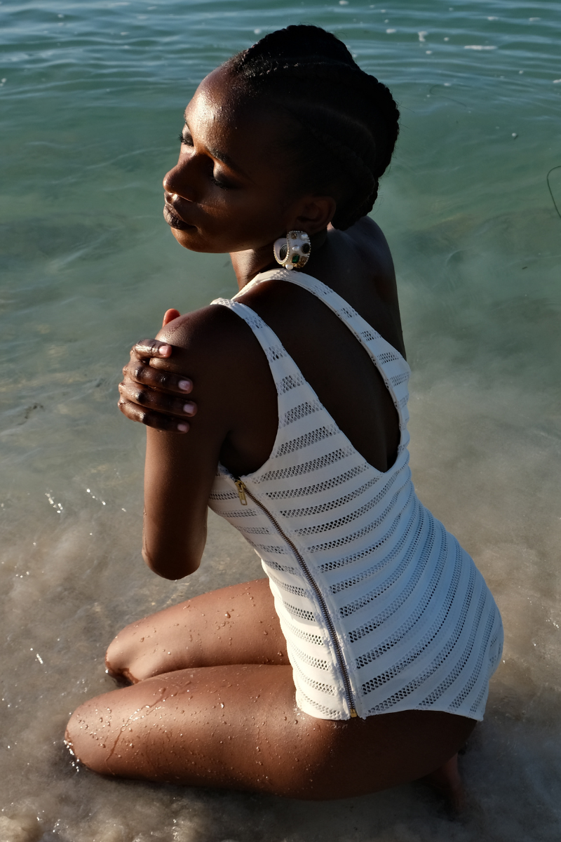 Woman wearing Anissa Mpungwe Atelier Moja Swimsuit