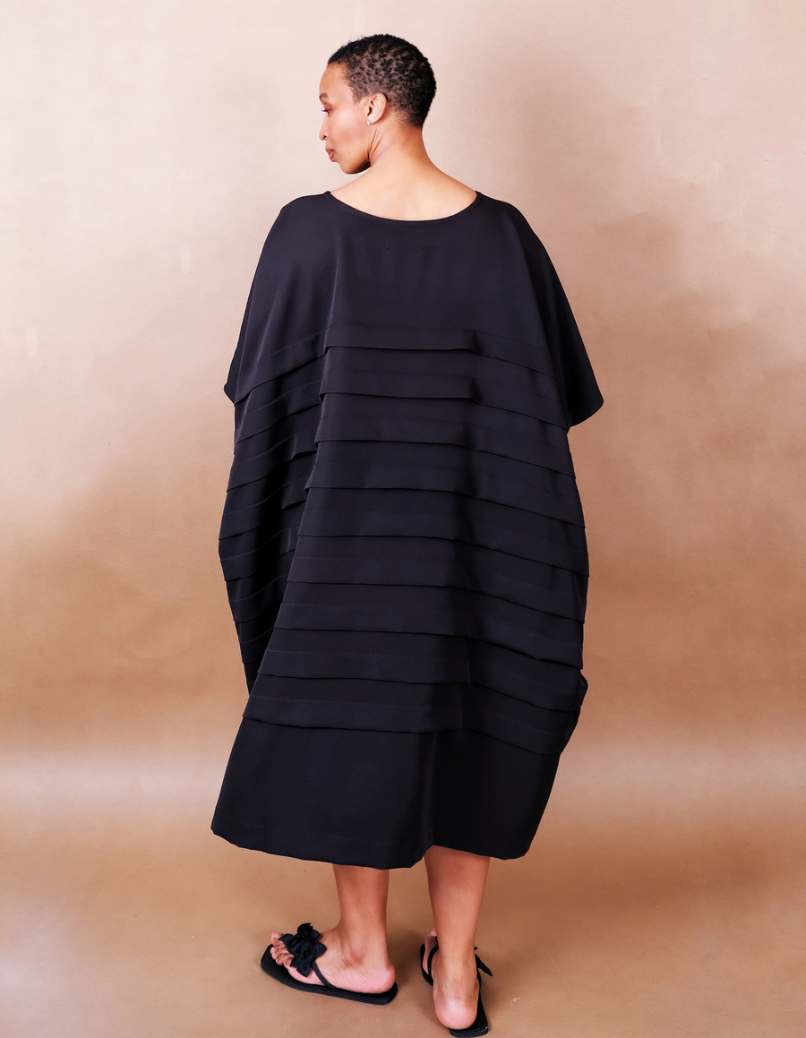 Anissa Mpungwe black pleated dress